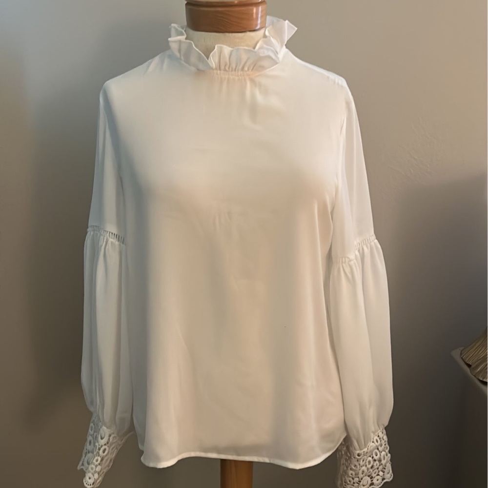 She in sheer top with lace accents